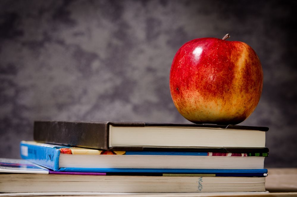 Pexels1 close-up-of-apple-on-top-of-books-256520.jpg