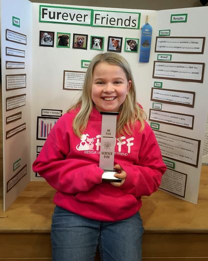 Carah Gilmore entered her school's science fair competition and advanced to higher levels with her project analyzing data about pet adoptions. (Images courtesy of Ryan Gilmore)